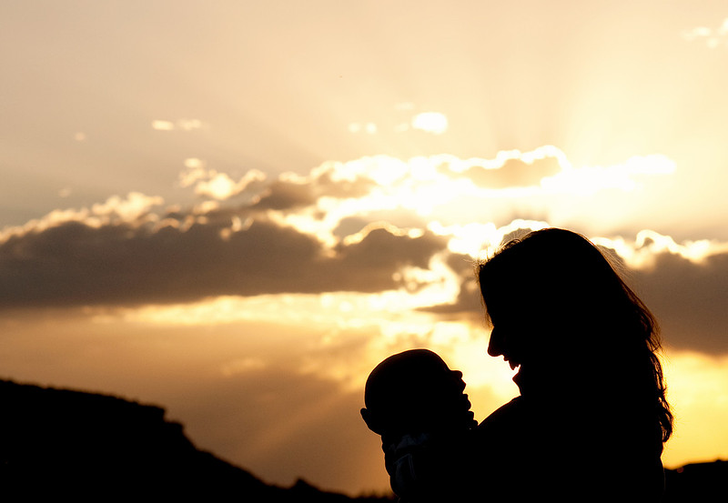 mother baby sunset silhouette